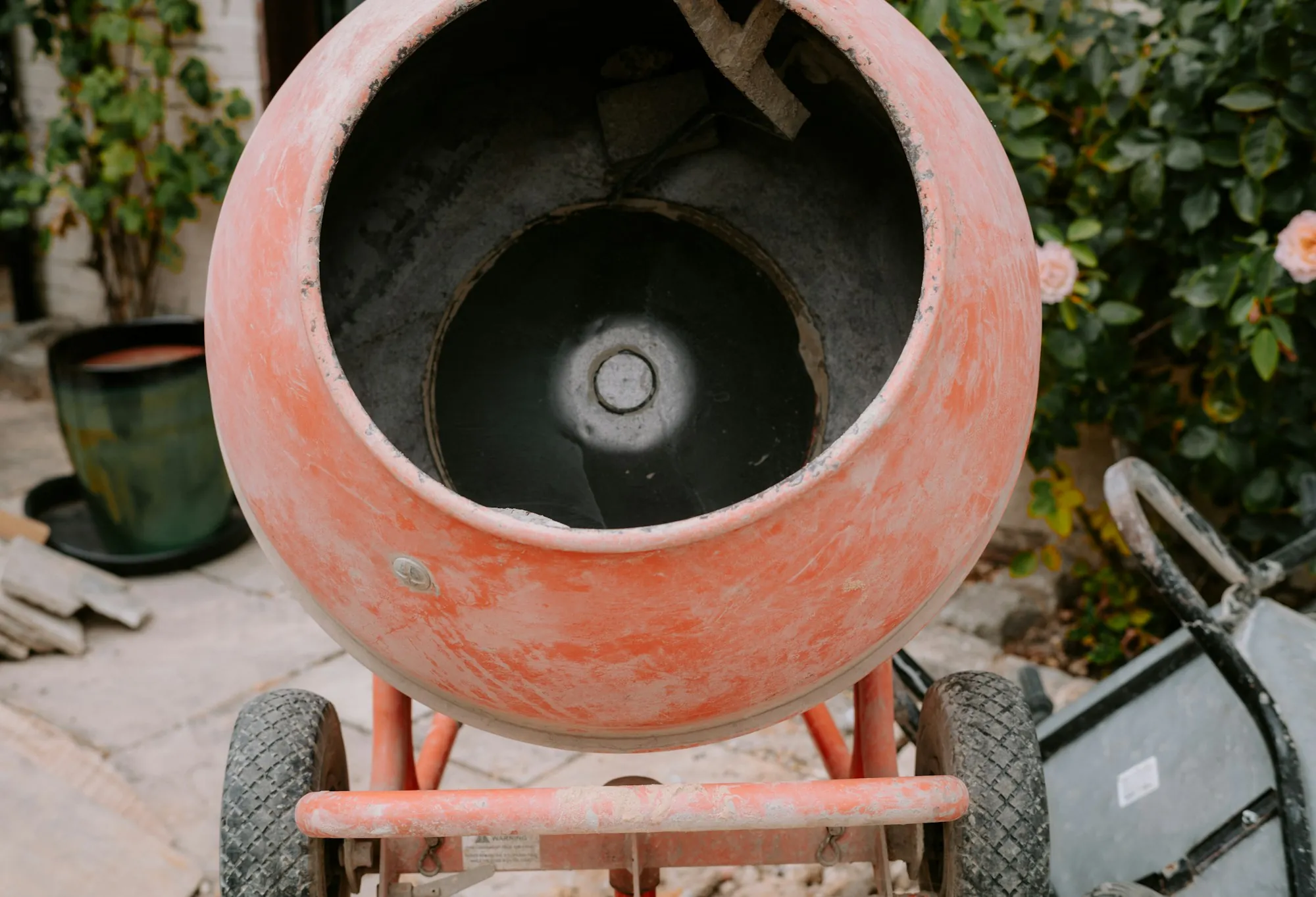 Orange portable cement mixer drum