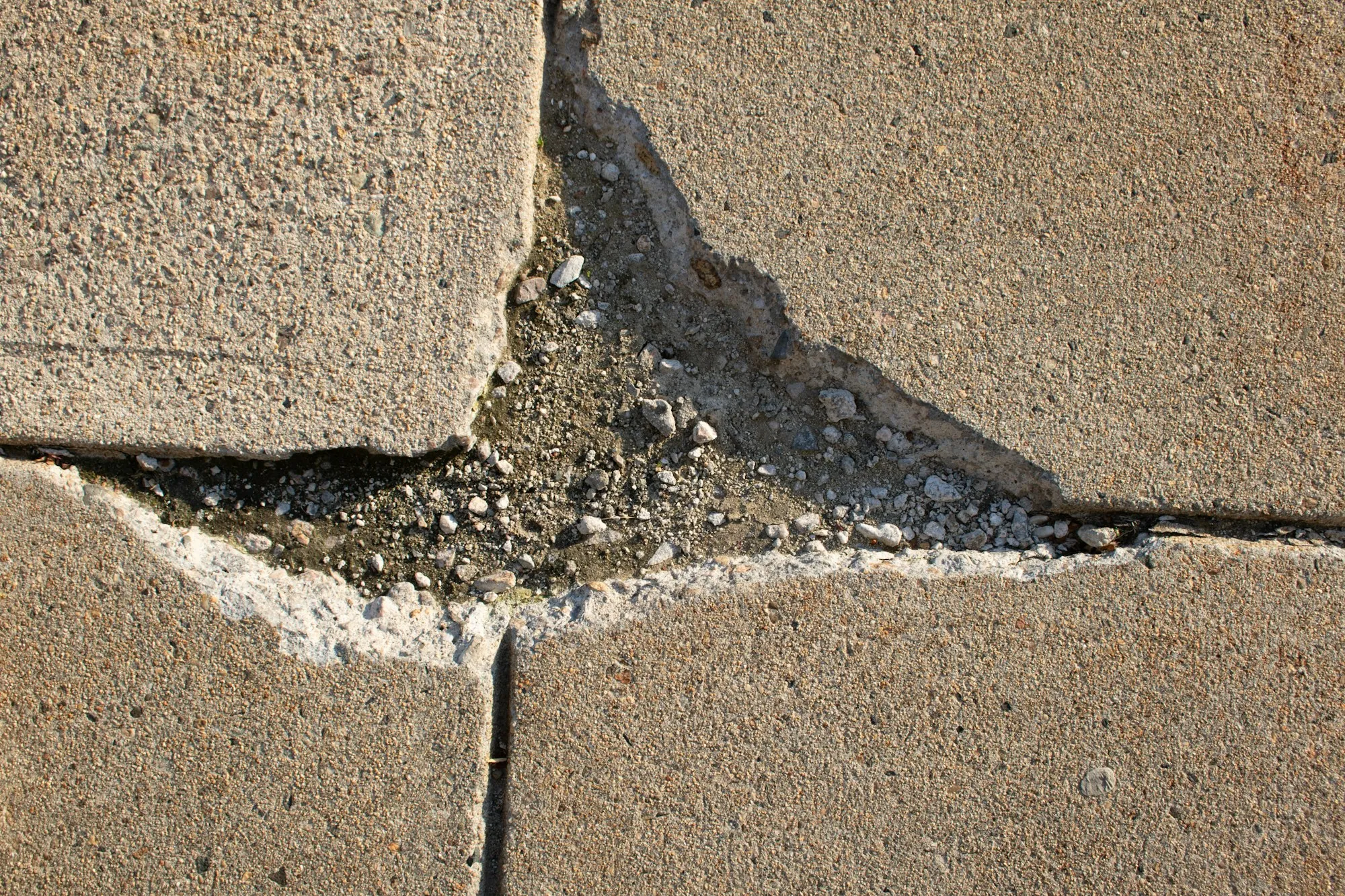 Cracked concrete slab joint in need of repair
